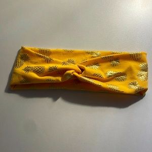 Yellow twist headband with gold pineapples